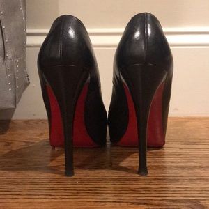 Black louboutin pumps